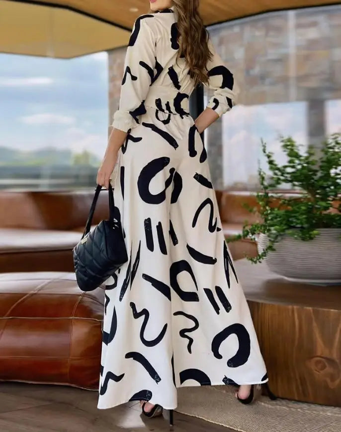 Tuta Elegante con Stampa Astratta in Bianco e Nero
