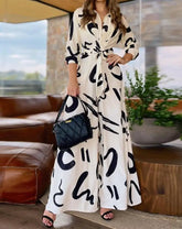 Tuta Elegante con Stampa Astratta in Bianco e Nero